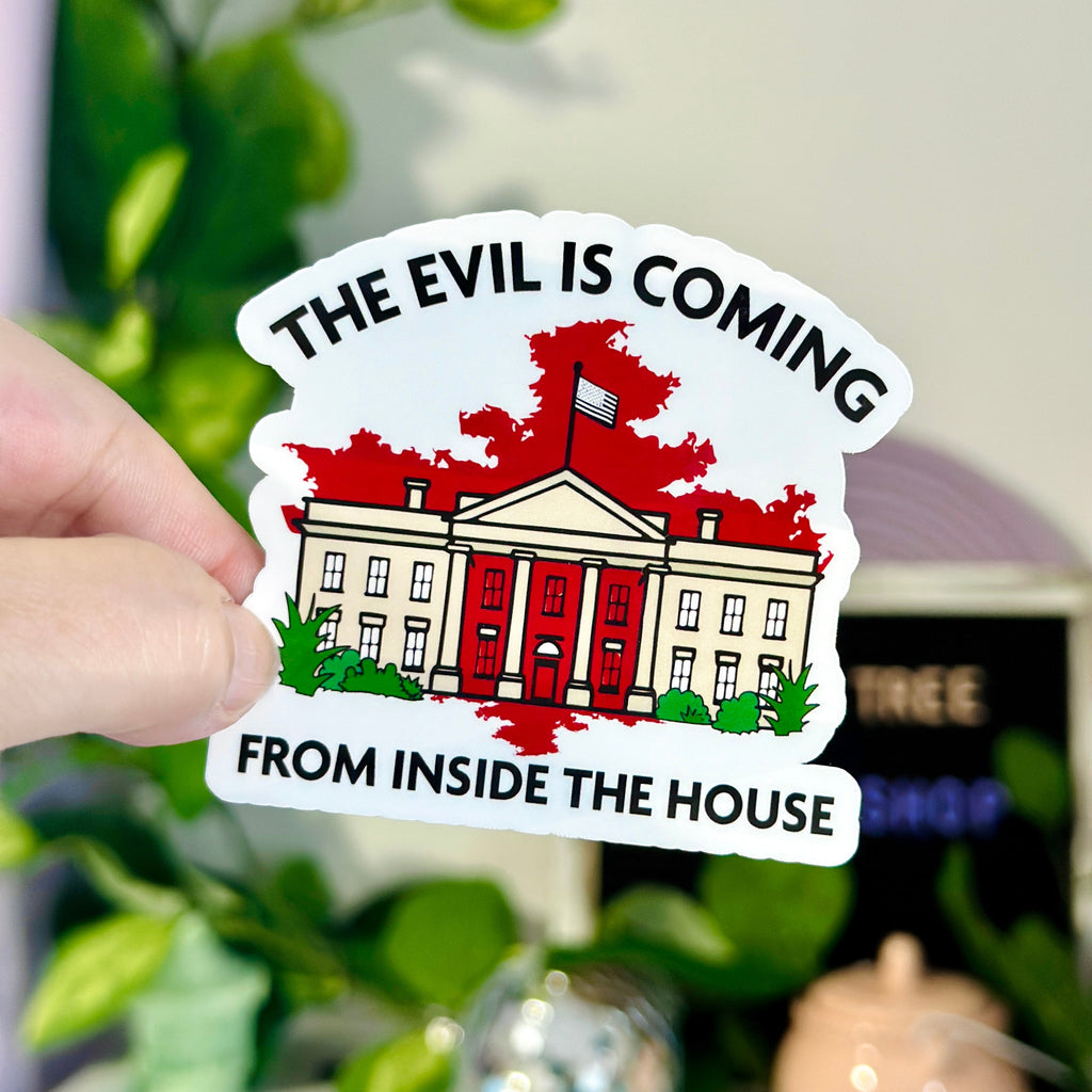 political protest sticker that reads “The Evil Is Coming From Inside the House” with illustration of the White House