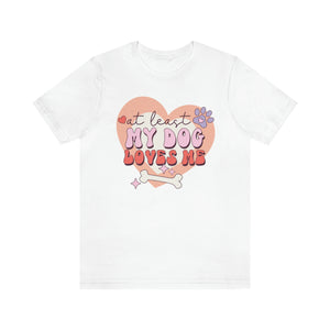 
            
                Load image into Gallery viewer, At Least My Dog Loves Me Retro Anti-Valentine&amp;#39;s Day Short Sleeve Tee
            
        