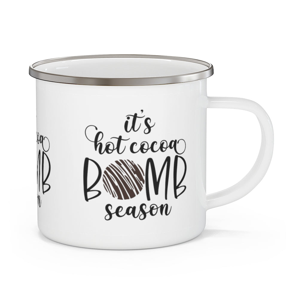 
            
                Load image into Gallery viewer, it&amp;#39;s hot cocoa bomb season enamel camping mug - white mug with black text and a cute chocolate brown cocoa bomb for the o
            
        