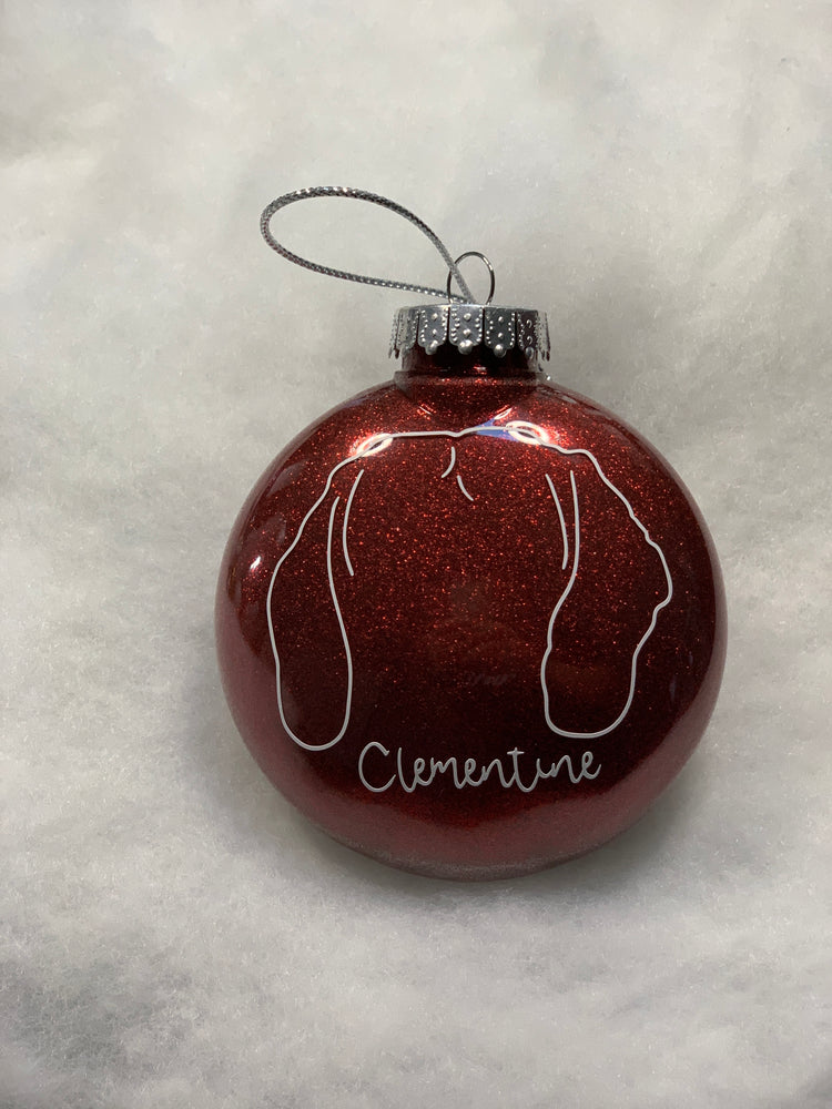 Custom hand drawn pet outline on a handmade glitter Christmas ornament 