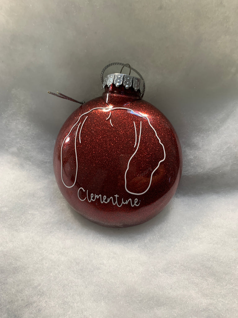 Custom hand drawn pet outline on a handmade glitter Christmas ornament 