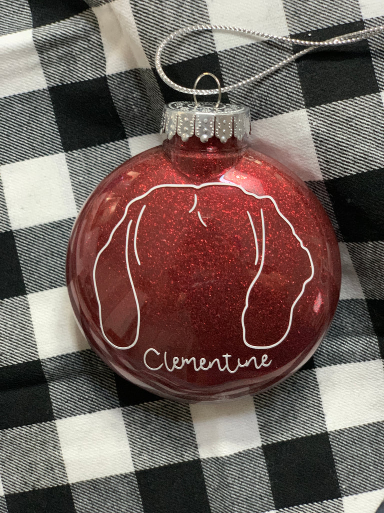 Custom hand drawn pet outline on a handmade glitter Christmas ornament 