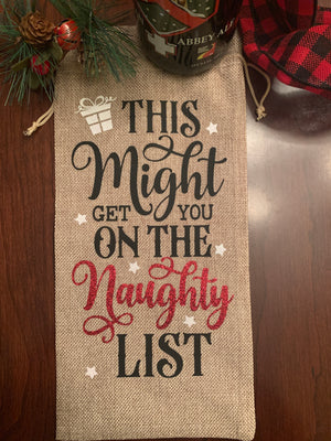 'Tis the season to get tipsy (responsibly) so why not make your gift extra special with a fun wine bag!  Handmade with red, green, white and silver glitter that sparkles like Christmas Lights! Available in red and burlap. 