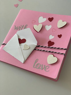 
            
                Load image into Gallery viewer, Love Letter 3D Papercraft Valentine&amp;#39;s Day Greeting Card with black and white bakers twine, mini envelope and floating 3d hearts
            
        