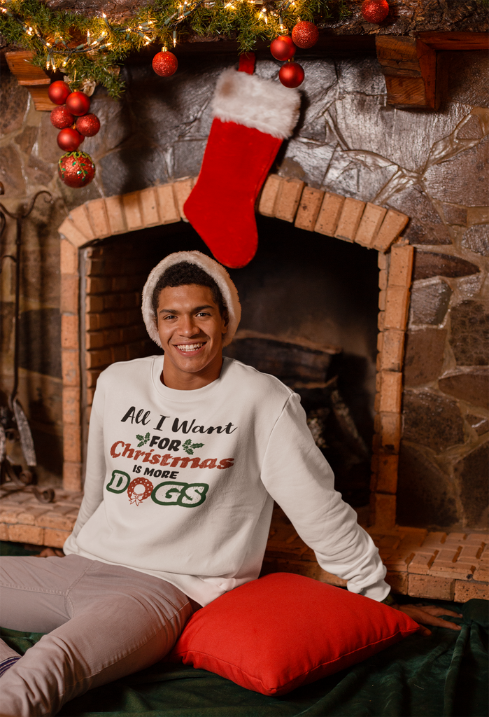 White crewneck sweatshirt with A Christmas Story inspired design "All I Want for Christmas is more Dogs"  in colorful red and green.