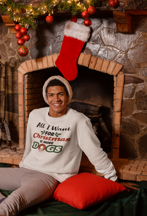 
            
                Load image into Gallery viewer, White crewneck sweatshirt with A Christmas Story inspired design &amp;quot;All I Want for Christmas is more Dogs&amp;quot;  in colorful red and green.
            
        